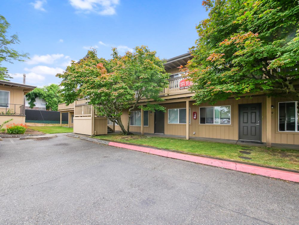 Walkway and landscaped grounds at Cherry Tree Apartments